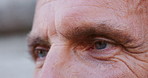 Eyes, thinking and mature man closeup with vision, optometry or remember memory in profile. Face, zoom and person with thoughts, eyesight health and ponder with reflection of idea with contact lenses