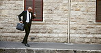 Dancing, happy and business black man in city on commute excited for promotion, job opportunity and success. Corporate, professional and person in urban town for celebration, achievement and victory
