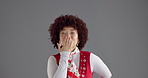 Blowing kiss, happy and face of woman in studio with peace sign, laughing and smile. Confidence, mockup space and portrait of person with love emoji, hand gesture and flirting on gray background