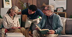 Caregiver, old people and elderly care with helping hand, talk and retirement home with knitting and reading book. Assistance, kindness and health worker with senior couple and hobbies for homecare
