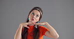 Face, smile and woman in studio with peace sign, shock and funny hand gesture for funky expression. Emoji, montage and happy portrait of excited girl on grey background space with positive attitude