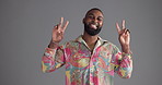 Happy, black man or peace sign with fashion in studio for clothing style on a gray background. Portrait, male person or hipster model with smile, hand gesture or emoji for cool outfit on mockup space