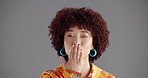 Studio, woman and face with kiss for blowing, romance and emoji gesture with expression for love. Mockup space, African female person and wink in portrait for flirting, connection or gray background