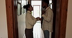 Couple, hallway and argument with anxiety, stress and drama at home or apartment. Frustrated, woman and man with conflict, angry and fight with toxic marriage and mistake or time crisis with partner