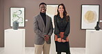 Business, teamwork and colleagues in office, smile and art director with file for project and gallery. Museum, face and happy people with collaboration for exhibition, curator and ambitious in Canada