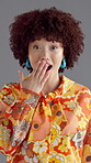 Face, woman and shocked for retro fashion of good news, announcement and giveaway winner in studio. Space, portrait or surprise person for wow, amazing deal and omg for sale gossip on gray background