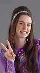 Woman, face and peace sign with vintage fashion in studio, happy and review emoji. Person, pin up style and laugh on gray background with reaction, hand V and gesture with support icon in Australia