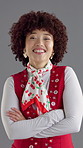 Face, woman and arms crossed for retro fashion, happiness and confidence with pattern neck scarf on gray background. Smile, portrait and African person with afro, vintage style or clothes in studio