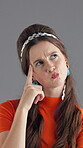 Woman, retro and thinking with fashion in studio with aha for eureka moment, insight and surprised by answer. Vintage style, face and solution on gray background with problem solving and conclusion