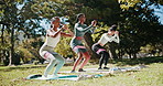 Resistance band, fitness and women in park, squats and training with workout, nature and wellness. Outdoor, friends and people with routine, morning and stretching with health, exercise and break