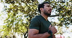 Nature, man and exercise with running for fitness, workout and marathon challenge for wellness. Outdoor, male person and runner with cardio for training, endurance or pace with athlete from low angle