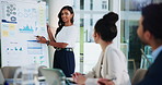 Woman, presentation and meeting in boardroom, charts and laptop with staff for financial planning at company. Person, speaker and group with questions, graphs and strategy for profit growth at agency