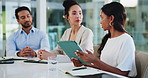 Collaboration, colleagues and people with tablet, discussion and brainstorming for project in boardroom. Business, team and group with tech for marketing campaign, talking and planning with research