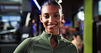 Face, woman and happy in gym for fitness, personal trainer or instructor for exercise and health. Pride, smile and professional coach for sports, athletes or wellness training with confidence