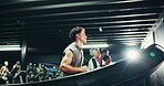 Athlete, fitness and running with man on treadmill in gym for cardio training, health or wellness. Exercise, machine and speed with runner in sports club for challenge, performance or workout