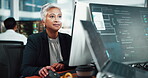 Woman, computer and screen with developer in office for programming, information and software update. Mature person, pc and testing for website development, coding server and troubleshooting system