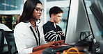 Woman, developer and typing on pc in office for research, programming and software update. Person, computer and information for web development, problem solving and troubleshooting for testing system