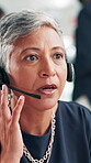 Talking, microphone and call center with business woman for customer support, help desk or virtual financial advisor. Contact us, investment banker and account consultant with mature person in office