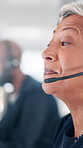 Business, call center and mature woman in office, telemarketing and conversation with advice. Person, employee and consultant in workplace, headset and help desk with customer service and talking