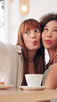 Friends, selfie and funny women together for social media post, online memory and hangout at cafe. Relationship, girls and happy for profile picture with bonding, tongue out and vlog at coffee shop