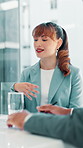 Meeting, discussion and businesswoman in office for feedback on magazine publishing advice. Conversation, professional and female editor explaining with review for creative project in workplace.