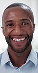 Face, employee and man with smile, office and sales representative with ambition in insurance company. Happy, broker and black person with pride for job promotion, corporate and business in Kenya