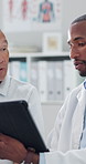 Healthcare, doctor and man with tablet, checkup and explaining diagnosis in clinic, help and online. Hospital, medical professional and results for senior patient on tech, people and consultation