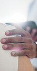 Person, hand and doctor with patient for sympathy, diagnosis or bad news at hospital. Closeup, medical worker and client with touch, empathy or comfort for health, support or cancer results at clinic
