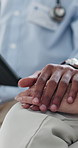 Doctor, people and holding hands with patient for comfort, empathy and cancer diagnosis. Support, closeup and medical professional console for bad news, kindness or help senior person with sympathy