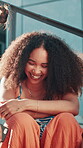 Outdoor, friends and women on break, laughing and listening to funny joke on roof, bonding and relax. Hangout, college students and people with humor for conversation, happiness and talking in city