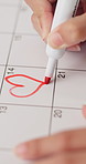 Person, hands and calendar with heart for valentines day, schedule or planning romantic date. Closeup, marker or love with agenda or event for month of romance, commitment or booking reservation 