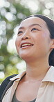 Hiking, thinking and breathing with asian woman in nature for explore, adventure and reflection. Inspiration, eco destination trip and trekking with person in forest for wellness, peace and fitness