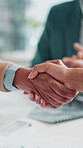 Closeup, contract and business people shaking hands in agreement for greeting, meeting or partnership. Merger, investment offer or investor with manager for B2B support, handshake or recruitment deal