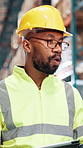 Black man, contractor or discussion with tablet for logistics, supply chain or distribution at warehouse. Male person, employee or talking with technology for inventory, stock or storage control