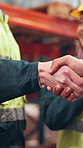 Business people, logistics and handshake with applause for agreement, partnership or b2b at warehouse. Closeup, employee or contractor shaking hands with deal for supply chain or teamwork at storage