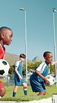 Children, jump and ball for soccer practice for agility training, balance exercise and sports workout. Kids, box and equipment to play game, learning skills and team fitness for match drill on field