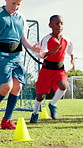 Drills, teamwork and soccer ball with children on field for running, training practice and game. Sports, exercise and tournament with kids outdoor for football player, coaching and learning together
