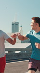 City, men and fist bump for fitness, wellness challenge and training for marathon on bridge. Outdoor, friends and running with endurance for exercise, cardio and morning jog on road with workout