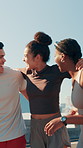 Friends, laughing and hug for workout, wellness challenge and training for marathon on bridge. Women, man and running people with endurance for exercise, cardio and morning jog on road with fitness