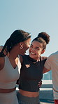 People, laughing and hug for workout, wellness challenge and training for marathon on bridge. Women, man and running friends with embrace for exercise, cardio and morning jog on road with fitness