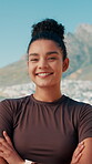 Outdoor, woman and face with confidence for fitness, marathon challenge or arms crossed with smile. Nature, female person and runner in portrait for workout pride, cardio exercise or athlete on break