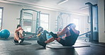 Fitness, class and people do push up in gym for core workout, exercise and training for wellness. Health club, sports and men and women with personal trainer for strength, wellness and strong muscles
