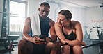 Fitness, smile and people in gym, smartphone and social media with influencer, conversation or texting. Friends, man or woman in wellness center, cellphone or communication with online reading or app