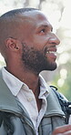 Hiking, thinking and calm with black man in nature for explore, adventure or reflection. Inspiration, eco destination trip and trekking tourism with person in forest for wellness, peace and fitness
