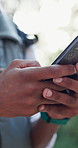 Phone, hands and man outdoor with mobile app for networking, communication or contact online. Technology, closeup and male person with cellphone for social media, email or social media in park.