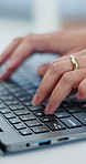 Typing, laptop and hands of business woman in office for online project, administration and research. Corporate, professional and person on computer for internet, website and planning for career