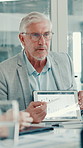 Meeting, tablet screen and businessman in office with statistics, graphs or charts for finance. Technology, presentation and mature male financial analyst with data for company investment planning.