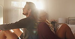 Home, relax and couple with smile in bedroom, romance and commitment to relationship, love and calm. Happy, man and bonding with woman on break, chilling and together with free time on bed in house