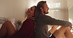Home, love and couple with smile in bedroom, romance and commitment to relationship, calm and relax. Happy, man and bonding with woman on break, chilling and together with free time on bed in house