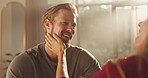 Woman, touch and partner with love at house for romance, affection and connection of relationship. People, date and laughing for funny joke of special moment, bonding together and marriage commitment